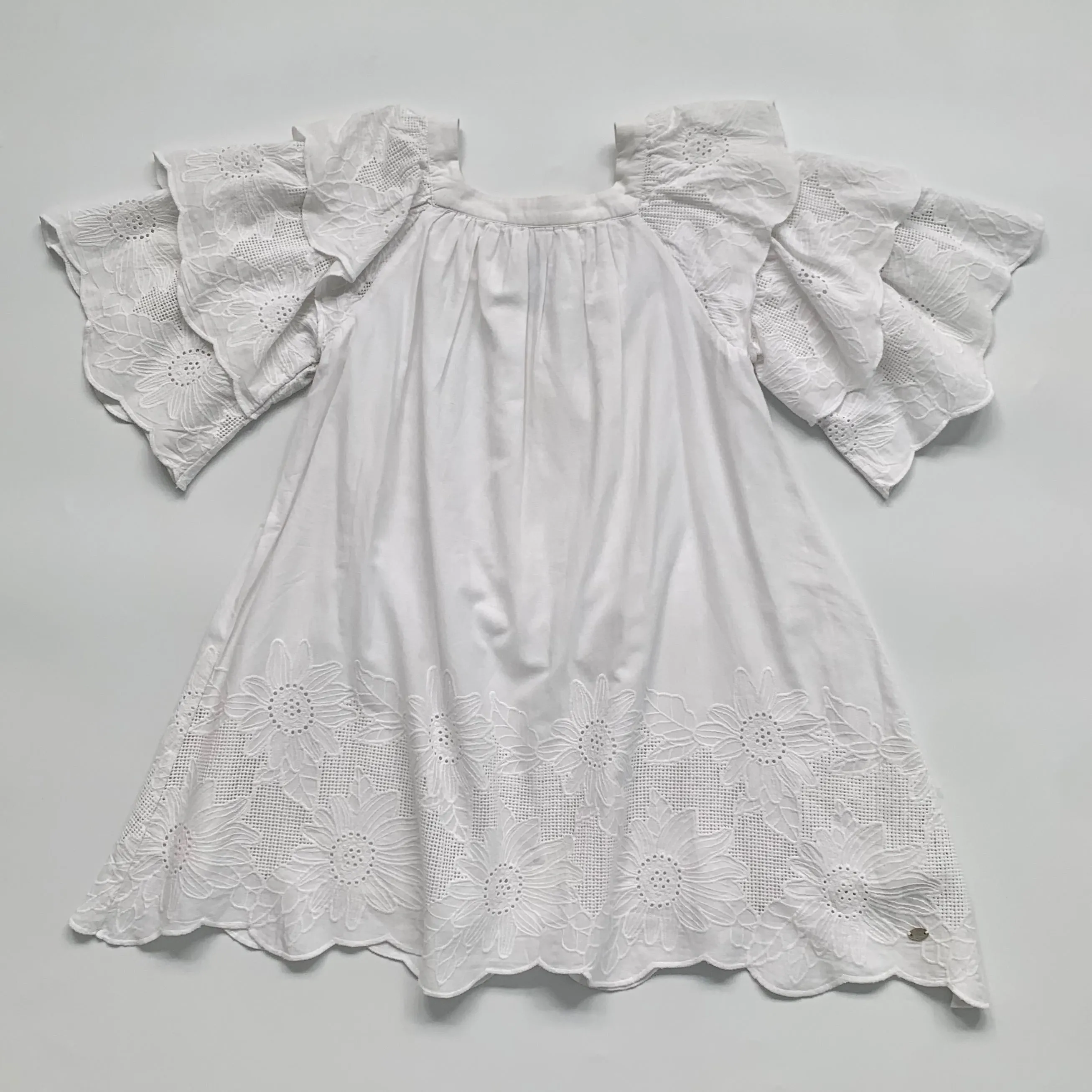 White Dress With Tier Sleeves: 12 Years;